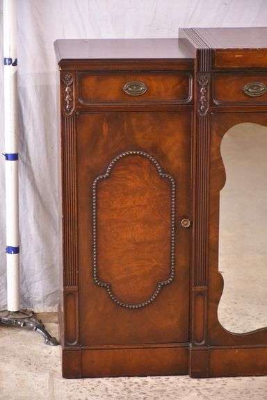 Mahogany credenza with leather top and mirrored doors; 21-2704