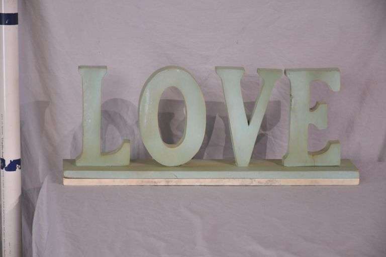 Carved wooden "Love" sign with marble base; 43-163