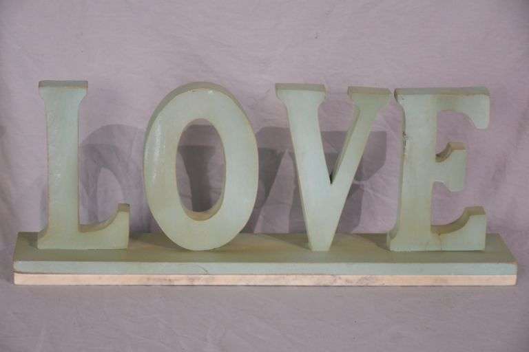 Carved wooden "Love" sign with marble base; 43-163