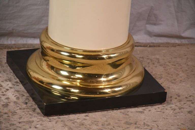 Off-white pedestal with brass caps; 55-12265