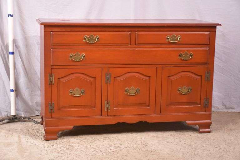 Cushman Colonial red sideboard with 3 drawers and 3 raised panel doors