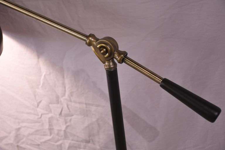 Black metal floor lamp with adjustable arm; 1153-094