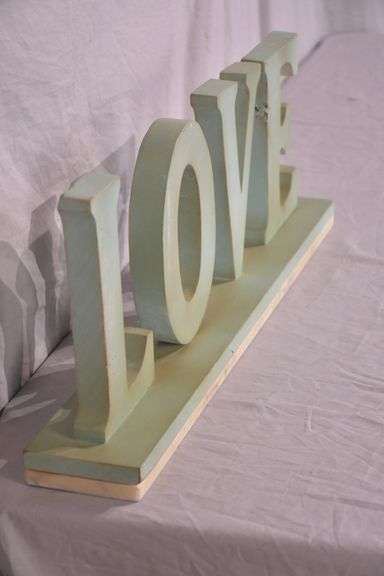 Carved wooden "Love" sign with marble base; 43-163