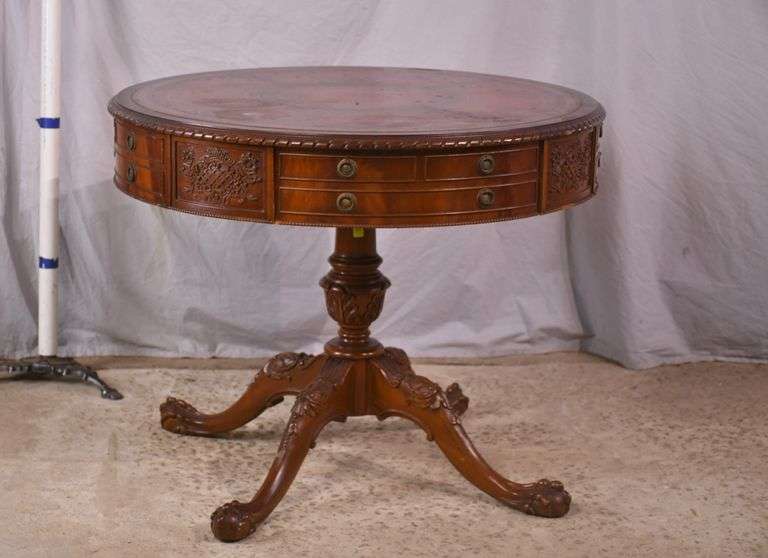 Round carved mahogany 2 drawers center table with leather top; 55-12235