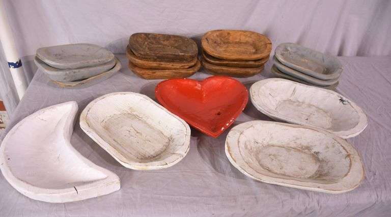Group of 17 hand carved wooden bowls; 1037-1161