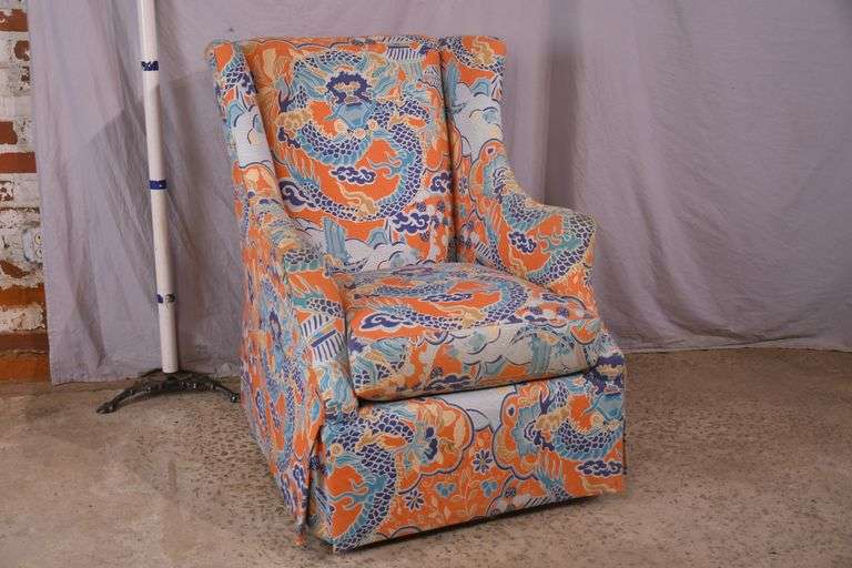 Upholstered wingback armchair with dragon pattern fabric; 336-4581