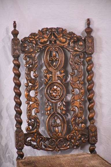 Heavily carved accent chair with barley twist legs, columns, and stretchers; 192-3100