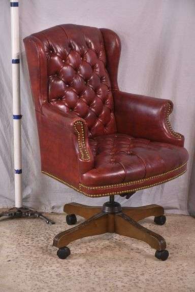 Burgundy tufted vinyl desk chair with swivel tilting seat; 74-12885