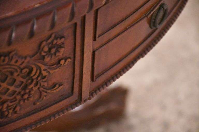 Round carved mahogany 2 drawers center table with leather top; 55-12235
