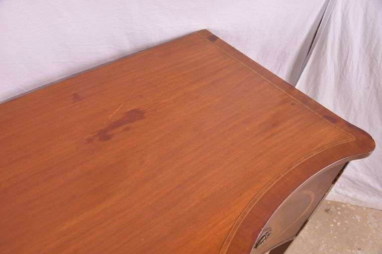 Inlaid crotch mahogany serpentine front sideboard; 74-12887