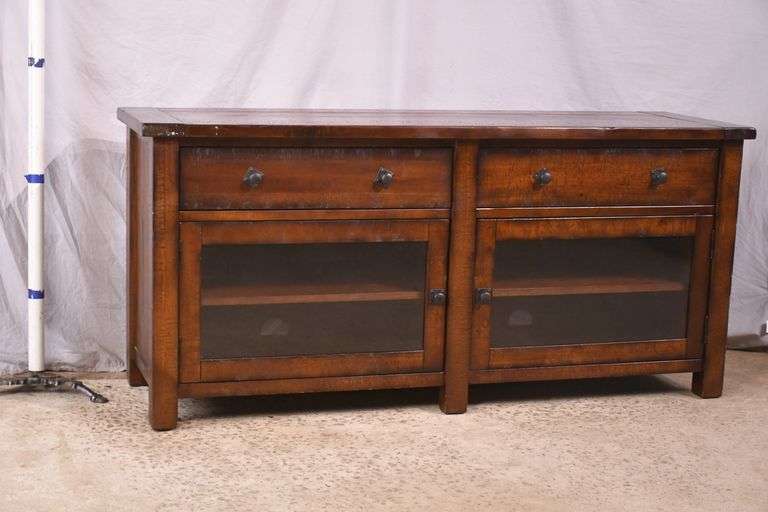 Pottery Barn distressed entertainment credenza with 2 drop-front drawers and 2 glass doors; 55-12263