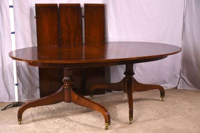 Oval mahogany double pedestal dining table with 3 leaves; 18301-001