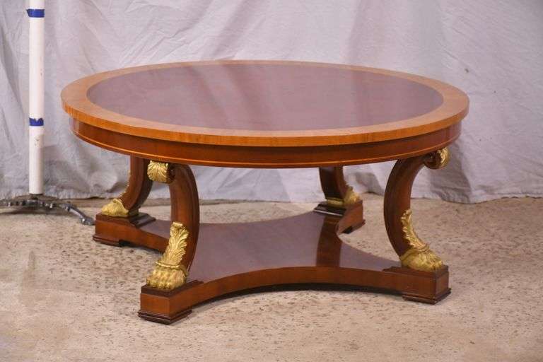 Kindel round inlaid mahogany coffee table; 4779-003