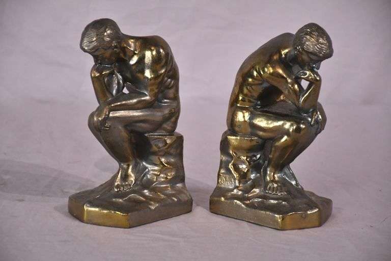 Pair of gold metal Thinking Man bookends; 1037-1159
