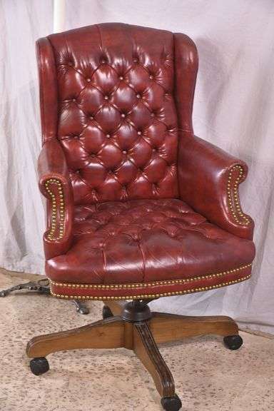 Burgundy tufted vinyl desk chair with swivel tilting seat; 74-12885