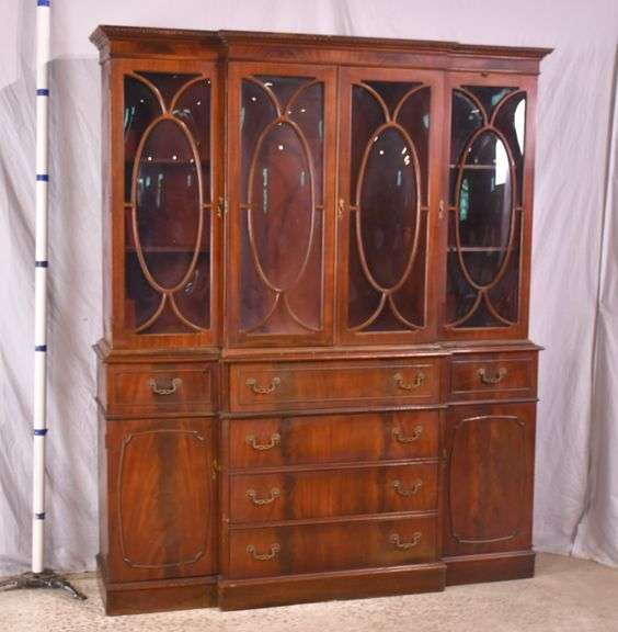 Crotch mahogany 2 part bubble glass breakfront; 74-12886