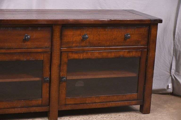 Pottery Barn distressed entertainment credenza with 2 drop-front drawers and 2 glass doors; 55-12263