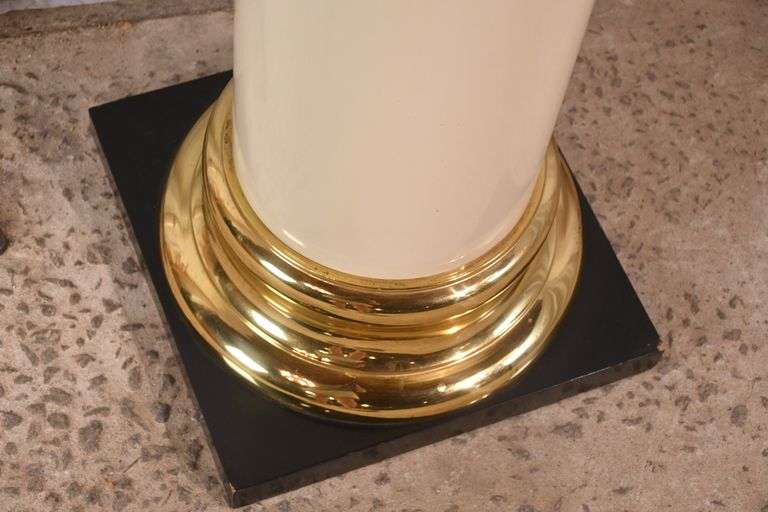 Off-white pedestal with brass caps; 55-12265
