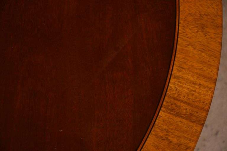 Kindel round inlaid mahogany coffee table; 4779-003