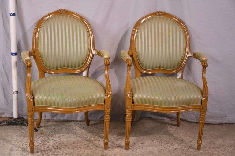Pair of carved French style open armchairs; 55-12305