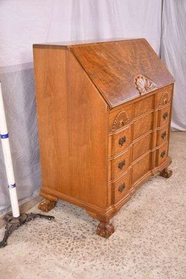 Burl walnut slant-front desk with ball in claw feet; 55-12174