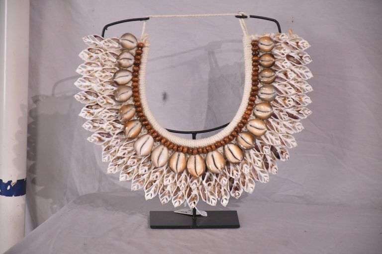 Puka shell necklace on stand; 16780-016