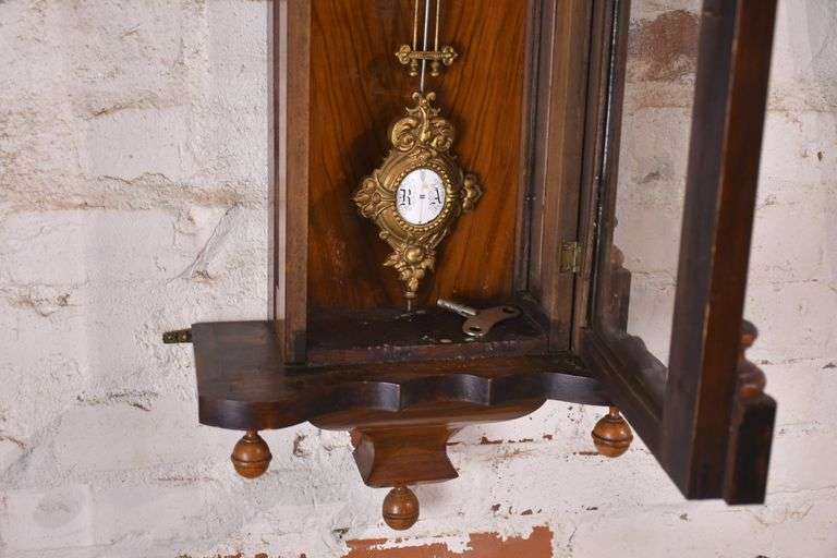 Vintage wall clock with carved walnut case; 18305-031