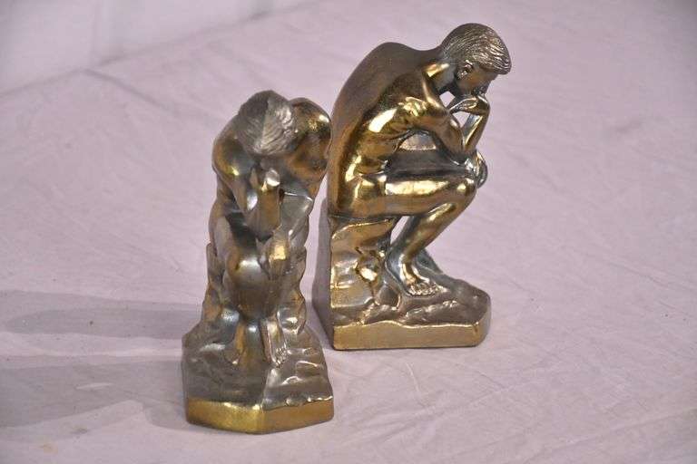 Pair of gold metal Thinking Man bookends; 1037-1159