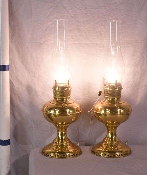 Pair of electric converted brass oil lamps; 396-1395
