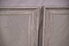 Pair of mirrors with distressed light gray frames; 336-4567