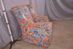 Upholstered wingback armchair with dragon pattern fabric; 336-4581