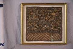 Small framed early Oriental style textile of a bird; 44-483