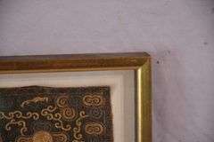 Small framed early Oriental style textile of a bird; 44-483