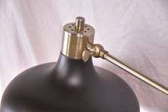 Black metal floor lamp with adjustable arm; 1153-094