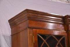 Crotch mahogany 2 part bowfront breakfront; 55-12189