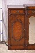 Mahogany credenza with leather top and mirrored doors; 21-2704