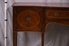 Inlaid crotch mahogany serpentine front sideboard; 74-12887