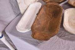 7 miscellaneous carved wooden dough bowls; 1037-1153B