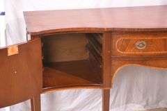 Inlaid crotch mahogany serpentine front sideboard; 74-12887