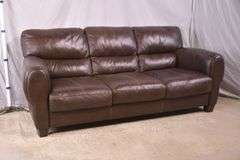 Brown leather type sofa; 1152-110