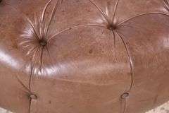 Round tufted leather ottoman; 55-12251