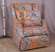 Upholstered wingback armchair with dragon pattern fabric; 336-4581