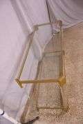 Lucite and gold metal console table with glass top and shelf; 74-12880