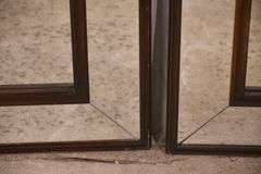 Pair of square mirrors with mahogany frames; 55-12315E