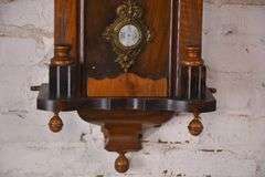 Vintage wall clock with carved walnut case; 18305-031