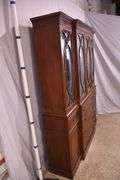 Crotch mahogany 2 part bubble glass breakfront; 74-12886