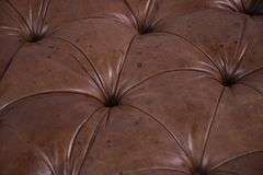 Round tufted leather ottoman; 55-12251