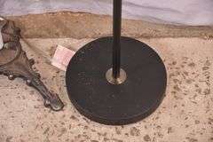 Black metal floor lamp with adjustable arm; 1153-094