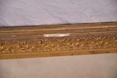 Early mirror with ornate gold frame; 1037-1166