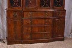 Crotch mahogany 2 part bubble glass breakfront; 74-12886